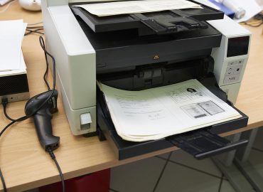 Dettaglio: stampante nell'ufficio informatico della cooperativa sociale verlata